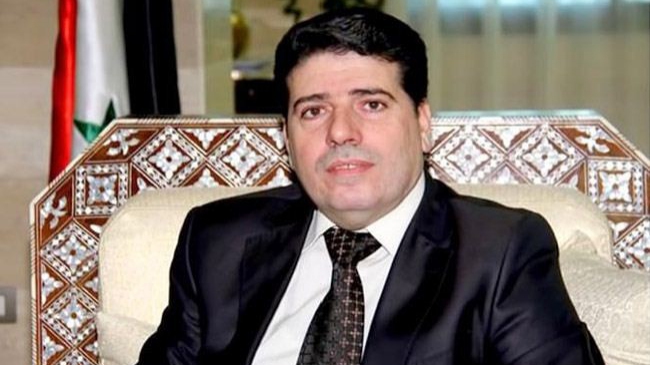 الأسد يكلف الحلقي بتشكيل حكومة جديدة